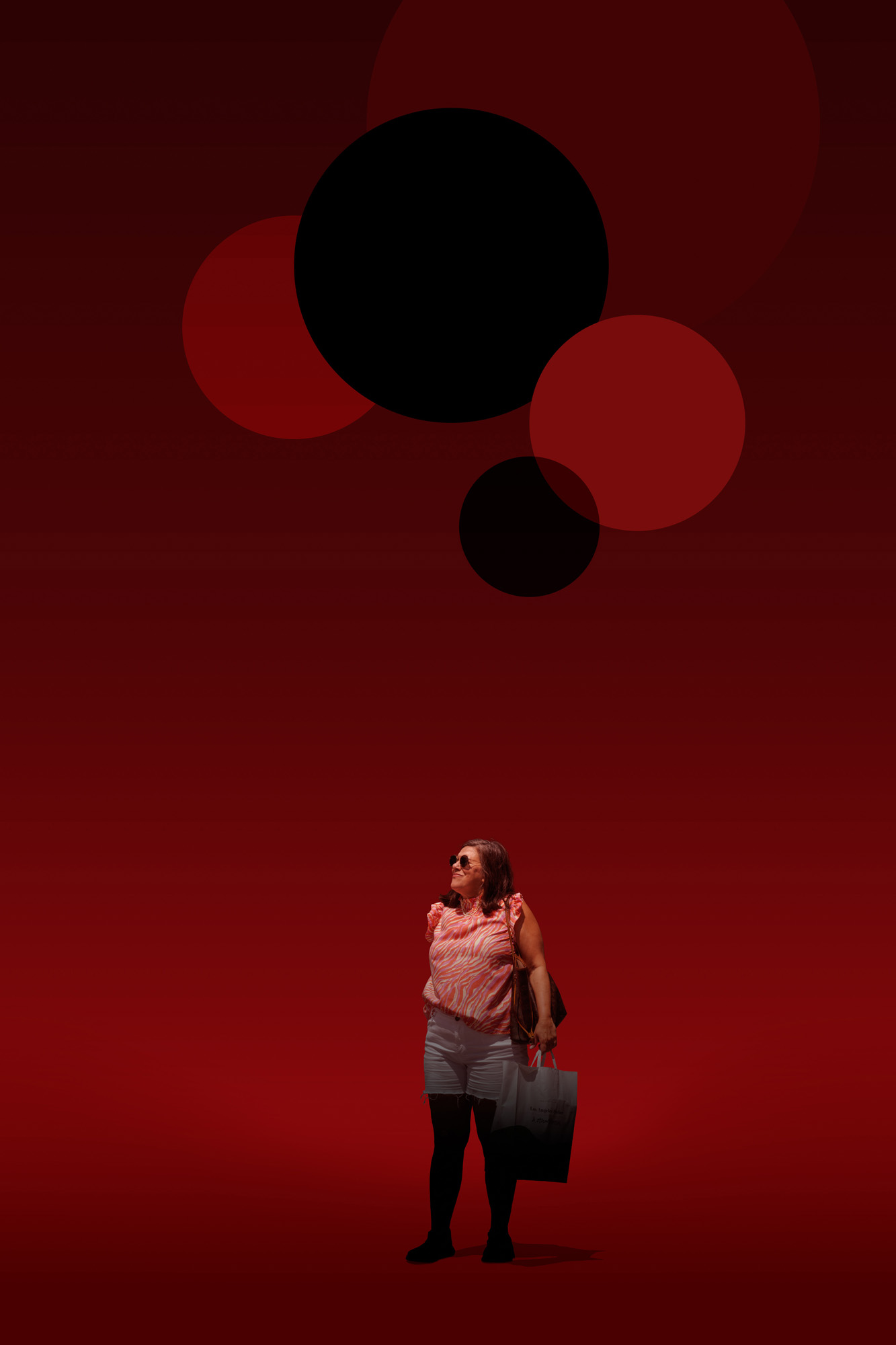 This is a color digital photograph featuring a person isolated in a significantly modified background. The image is dominated by a black and red color palette, and graphics that reference eonomic indicators. While the image started with street photography, the additional colors and graphics tie the image to economic conditions.