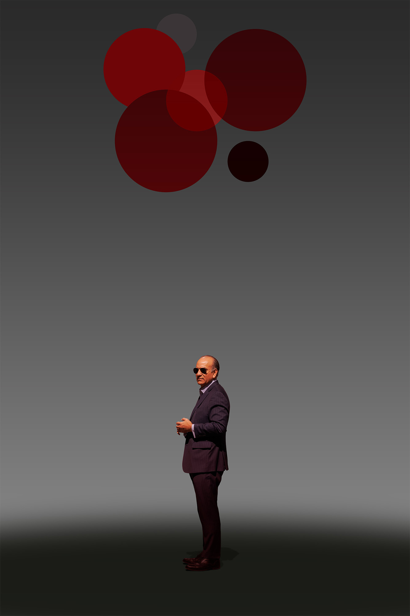 This is a color digital photograph featuring a person isolated in a significantly modified background. The image is dominated by a black and red color palette, and graphics that reference eonomic indicators. While the image started with street photography, the additional colors and graphics tie the image to economic conditions.