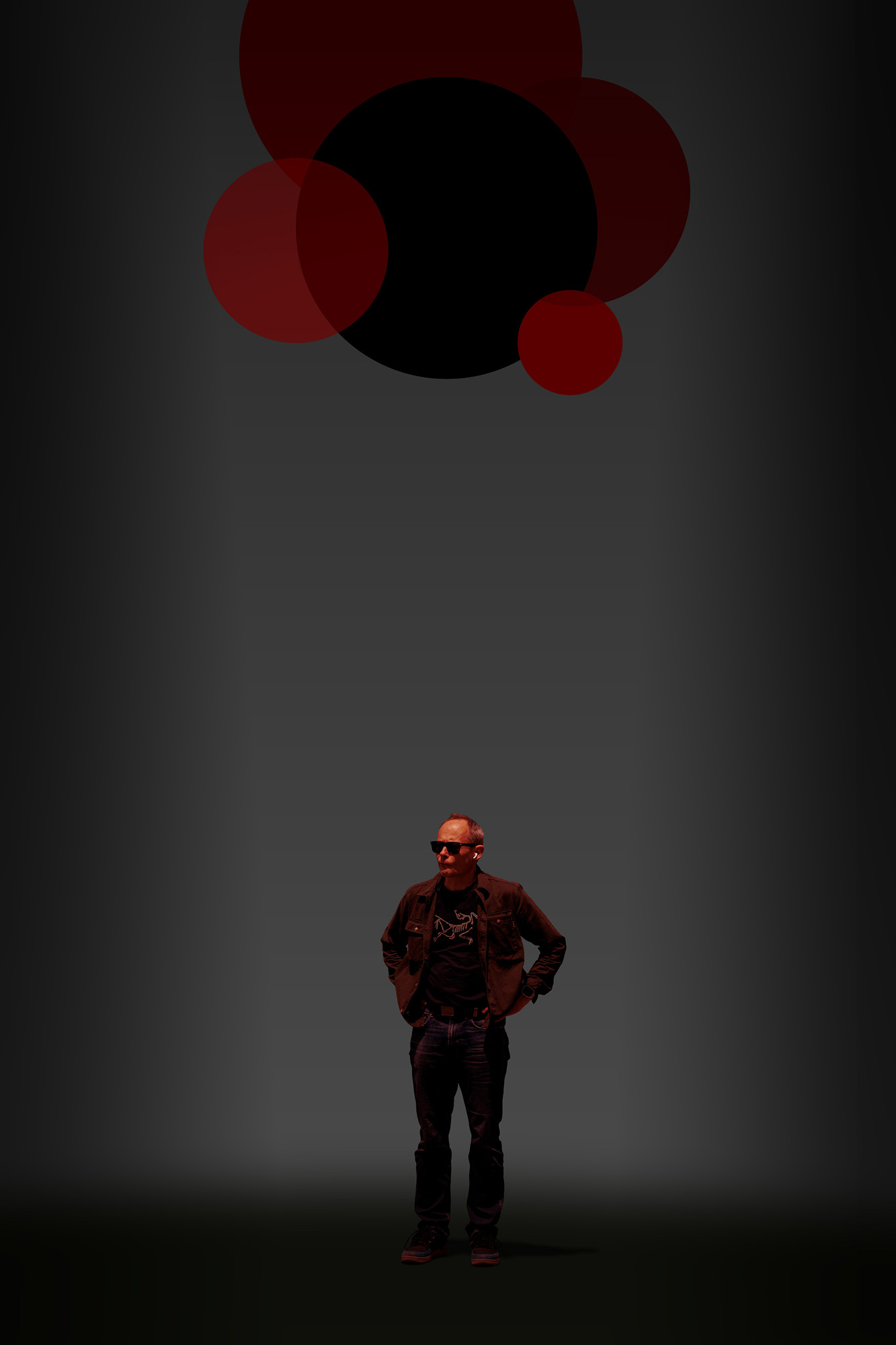 This is a color digital photograph featuring a person isolated in a significantly modified background. The image is dominated by a black and red color palette, and graphics that reference eonomic indicators. While the image started with street photography, the additional colors and graphics tie the image to economic conditions.